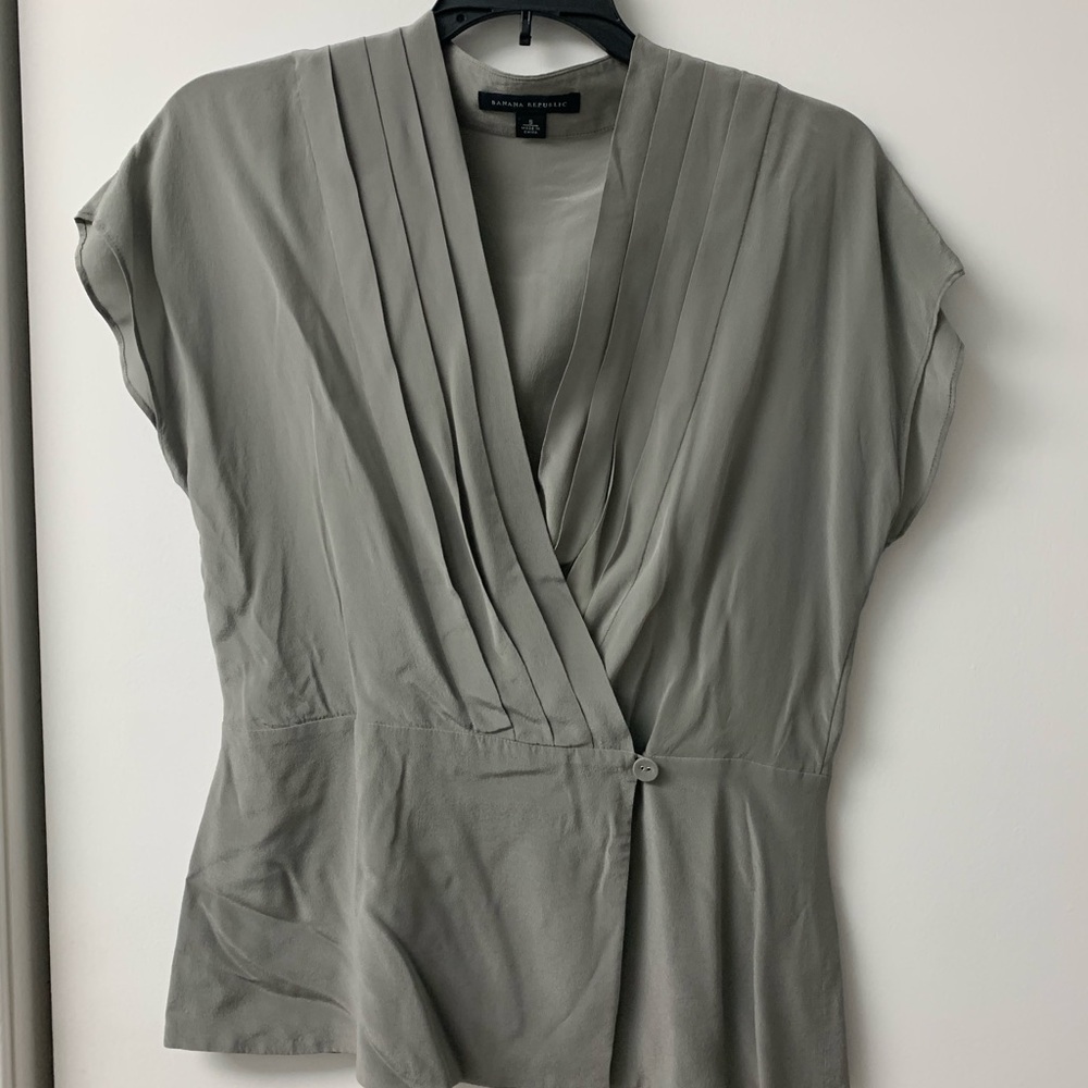 Grey silk faux wrap blouse.